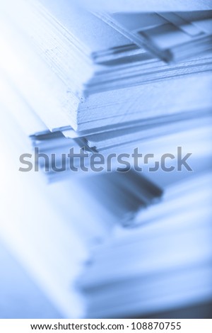 Stack of paper cards in blue