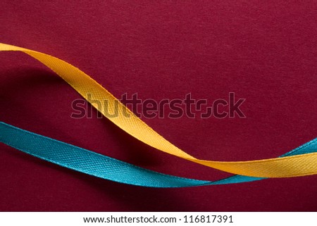 Background with blue and yellow ribbons