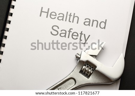 Health and safety register with spanner