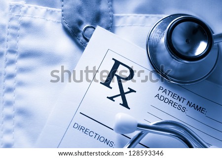 Stethoscope and patient list on doctor\'s smock