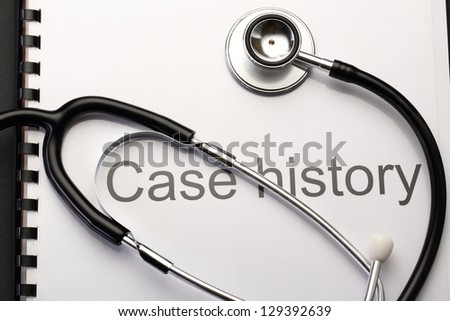 Case history and stethoscope on black