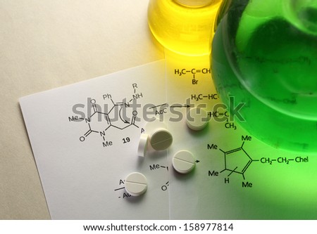 Chemistry reaction formula with white pills