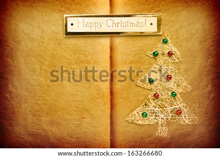 Open book with Happy Christmas label