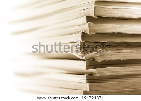 Stack of old magazines as background