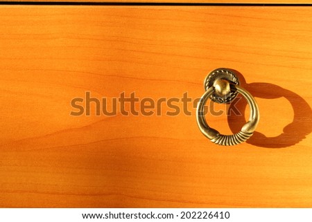 Metal round handle on base unit