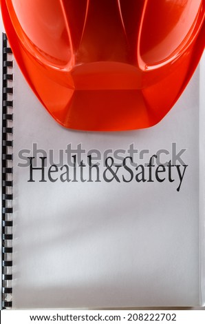 Health and safety with red helmet