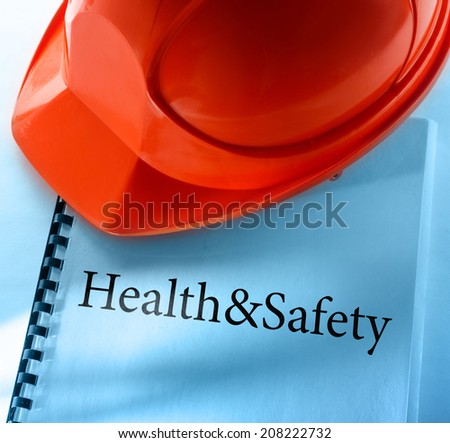 Health and safety with red helmet