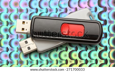 Usb flash drives on the abstract background