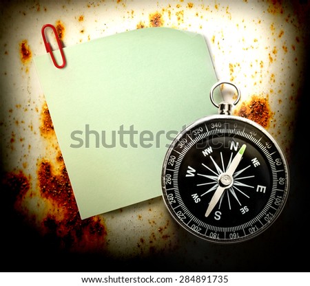 Blank green sticker with red clip and compass