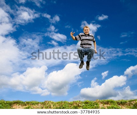 The flying person in the blue sky.