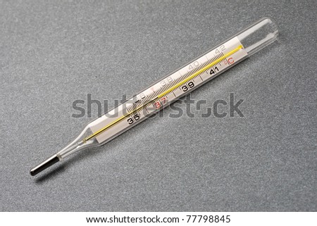 Thermometer isolated on the grey background