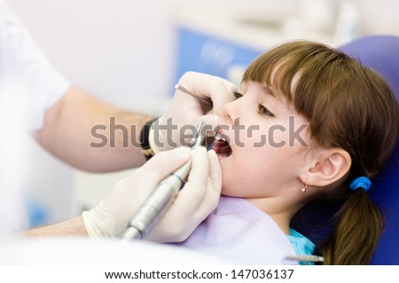 close-up medical dentist procedure of teeth polishing with clean