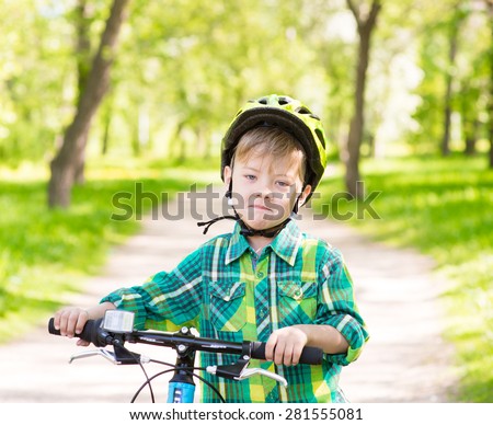 child learns to ride a bike