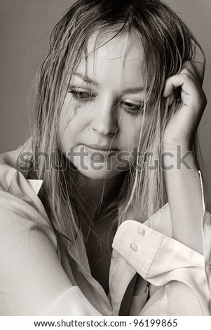 portrait of a sad young woman crying