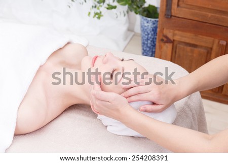 Young woman to head massage