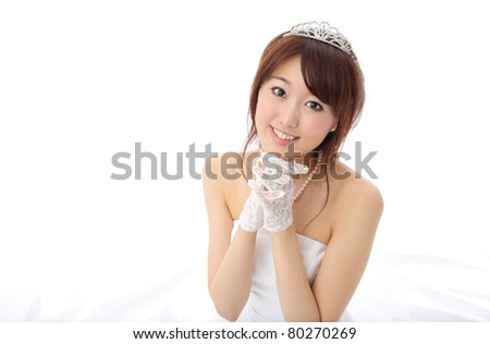 stock photo Young Asian woman wearing a wedding dress