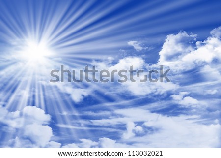 blue sky with clouds, sun and sun rays