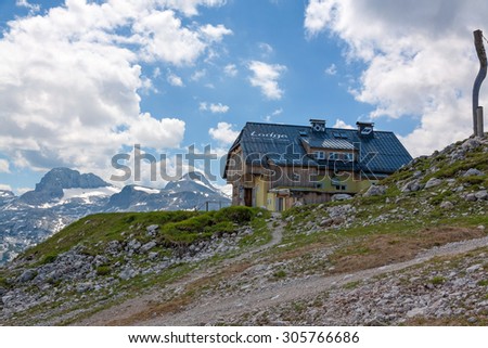 Obertraun, Austria - June 27, 2014: Dachstein Lodge - on top of Dachstein mountains, for tourists and hikers to sleep, eat and drink..