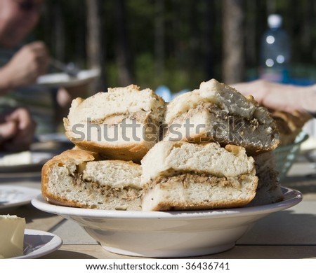 meal with traditional russian yeast pie eating outdoors