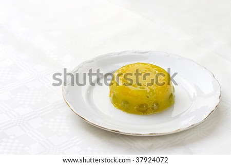 orange gelatin dessert with grape