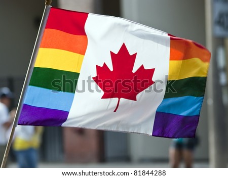 TORONTO, ONTARIO, CANADA - JULY 3: Canadian Pride flag with maple leaf  at the 2011 Annual Gay Pride Parade in Toronto on July 3, 2011.