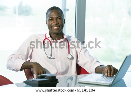Casual male doctor in his studio