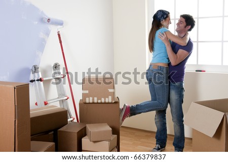 Happy couple on their moving day