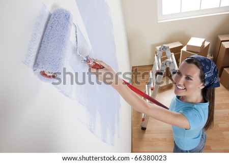 Young woman painting