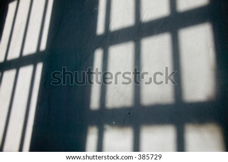 Shadows of jail cell bars