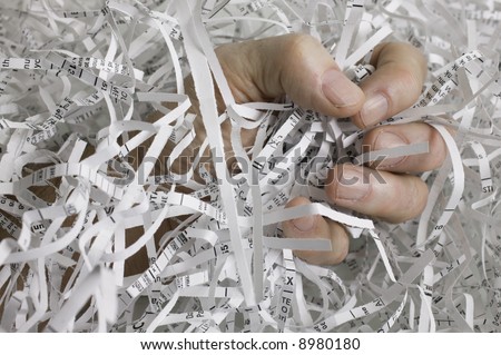 Fighting identity theft by shredding sensitive documents. Also shows frustration of the thief.
