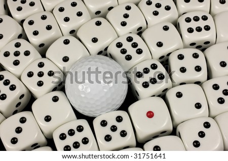 Golf ball amongst dice makes for risky shot.