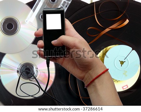 Sound carrier of the past times and player MP3