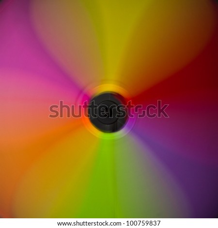 Colorful abstract windmill against a black background