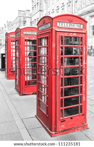 Row of traditional red phone booth in england