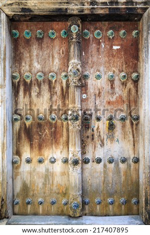 Hand crafted wooden door post at Stone Town, Zanzibar
