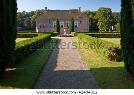 Old medieval mansion with hugh garden in the Netherlands