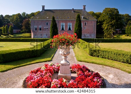 Old medieval mansion with hugh garden in the Netherlands