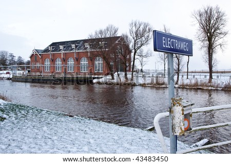 Water pumping industrial building in winter time