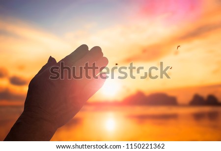 The concept of God\'s salvation:Human hands open palm up worship