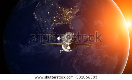 Spacecraft Progress orbiting the earth. Elements of this image furnished by NASA.