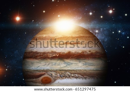 Solar System - Jupiter. It is the fifth planet from the Sun and the largest in the Solar System. Its a giant planet with a mass one-thousandth that of the Sun. Elements of this image furnished by NASA