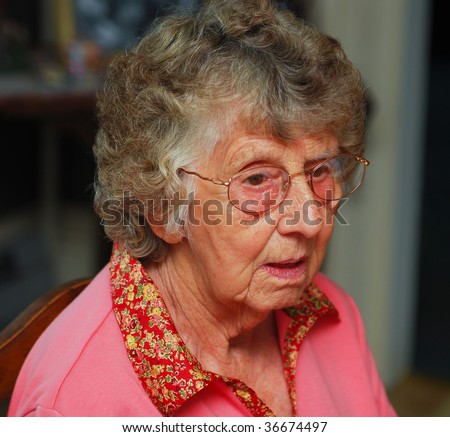 Portrait of a senior woman with a confused expression