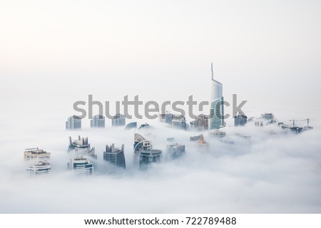 When cold desert air meets warm ocean air at the start of the winter, Dubai witnesses a unique sight of world’s highest skyscrapers drowning in fog. Dubai, UAE.