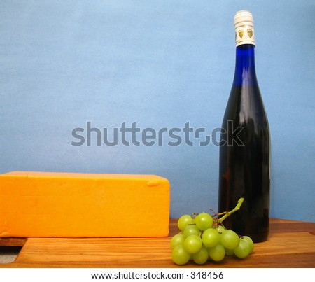 Wine and block of cheese