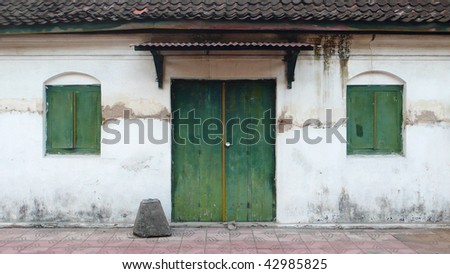 the old green door and windows