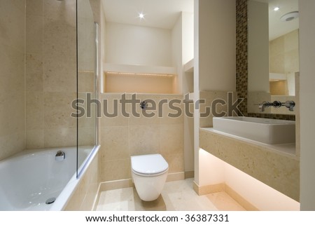 contemporary bathroom with natural stone tiles