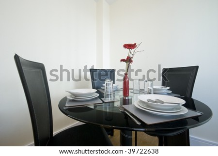 modern dining table set up with flowers