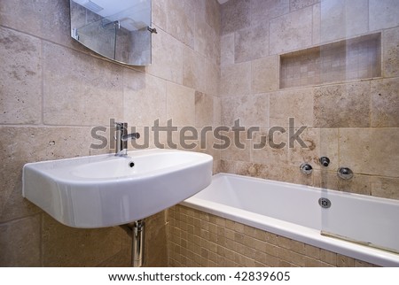 luxury stone tiled bathroom