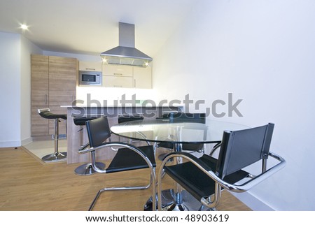 Modern fully fitted kitchen with dining area