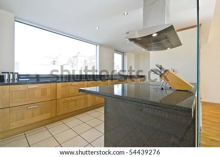 Brand new contemporary open plan kitchen with modern appliances and cons